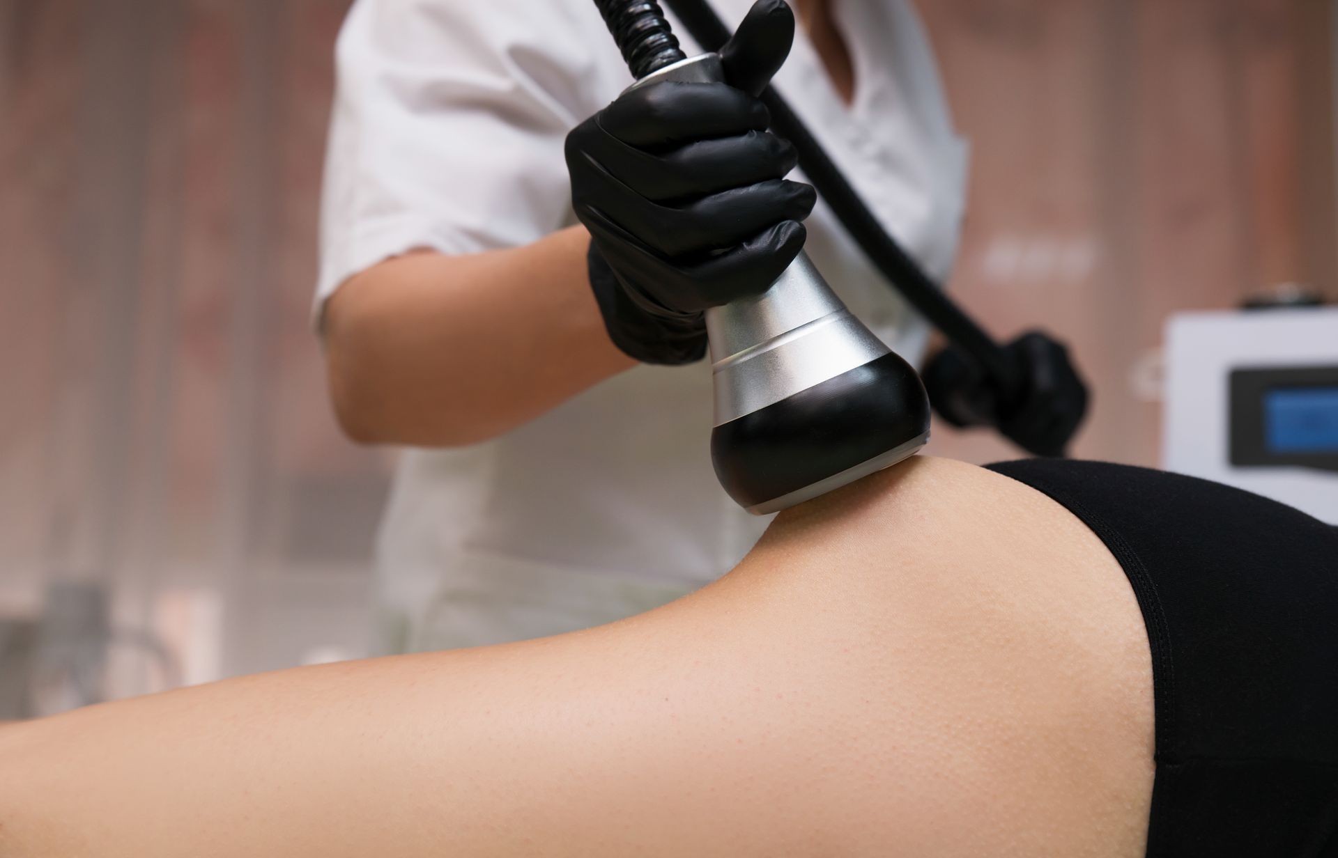 Vacuum massage. Woman getting anti cellulite procedure in a beauty SPA salon. Body contouring treatment in clinic.  Lipomassage procedure on female body. Body care.